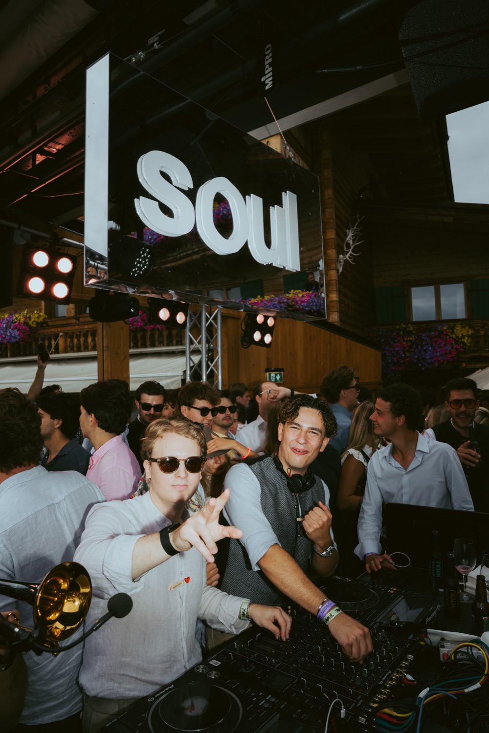 Ben Paul and another DJ at the booth under the SOUL. sign