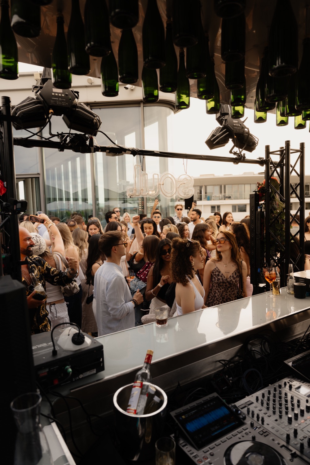 Rooftop crowd and DJ booth at SOUL.